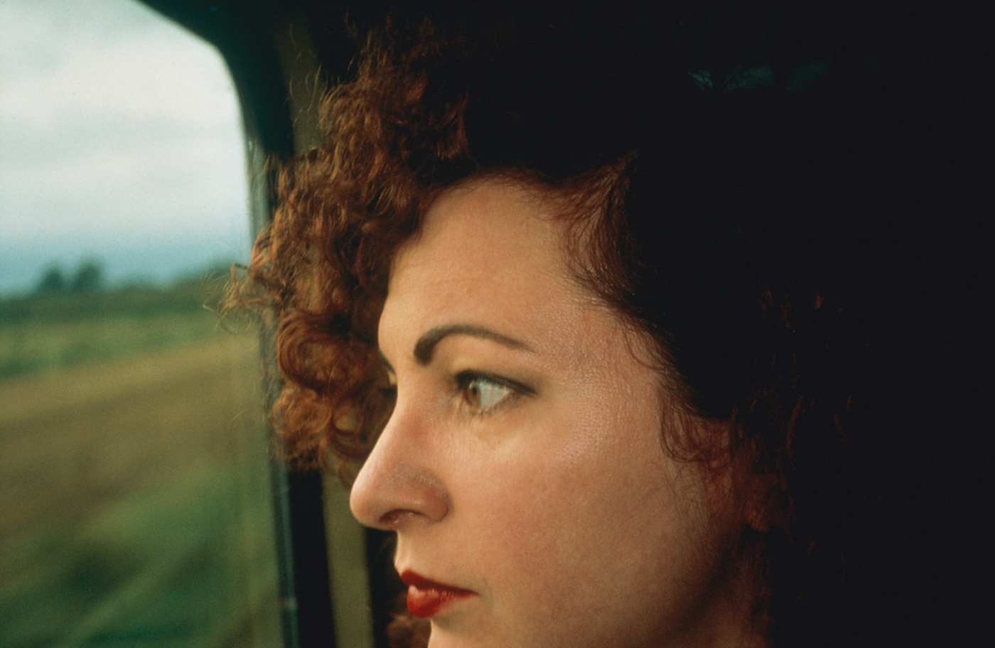 Nan Goldin self-portrait on the train