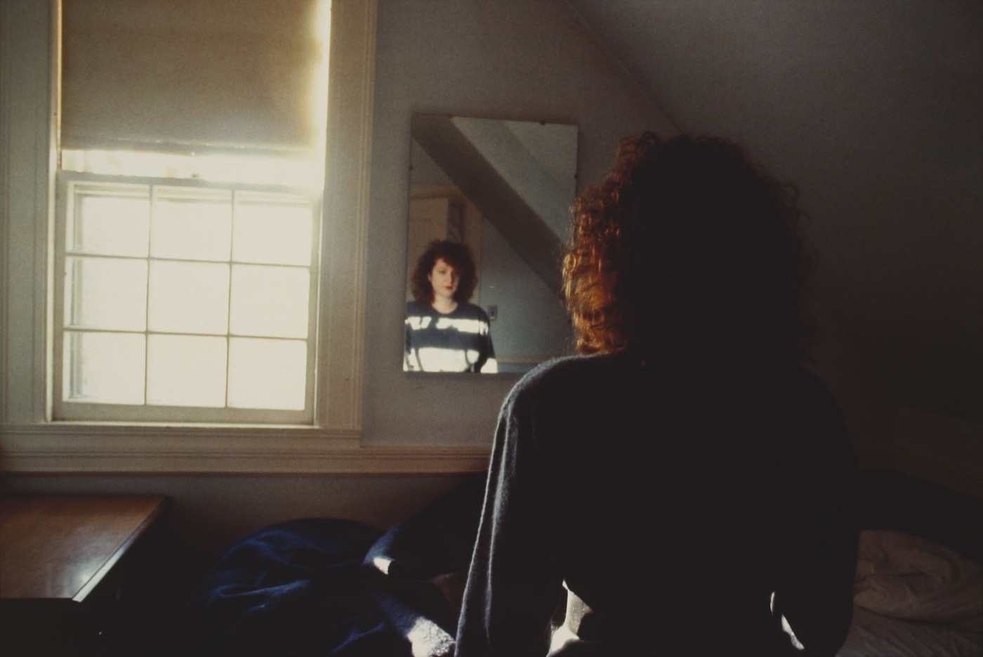 Nan Goldin self-portrait in the mirror